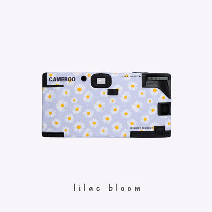 Back view of Daisy Bloom purple disposable camera featuring white daisy floral design